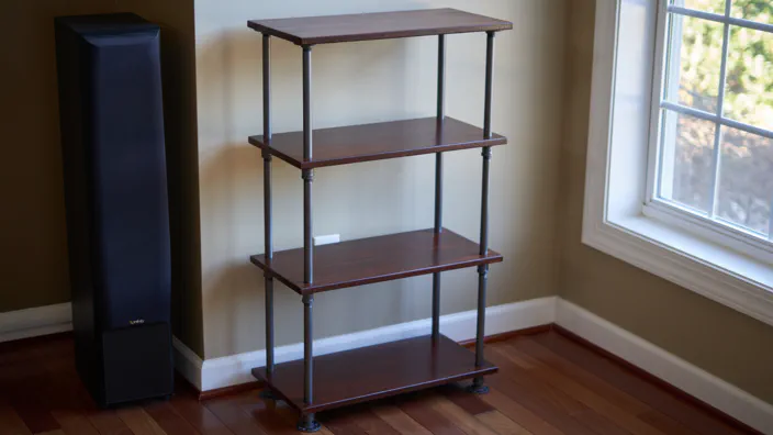 A set of industrial-style wood and steel pipe shelves.