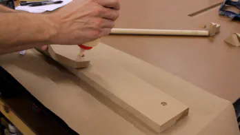 Glue is applied to the side edges of the back.
