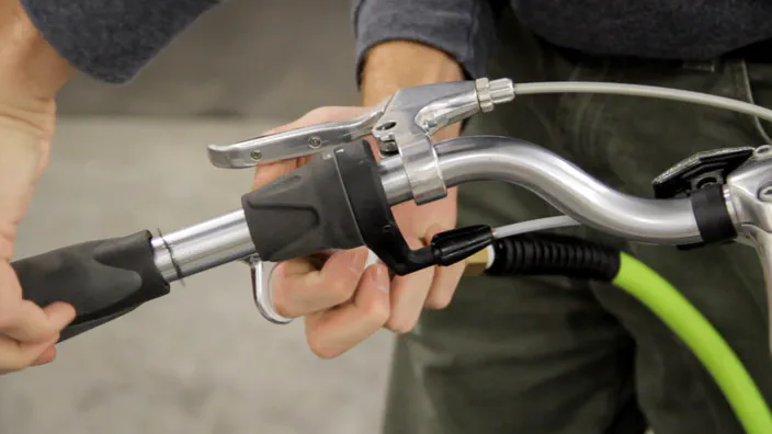 A compressed air sprayer is used to remove a bicycle handle grip.