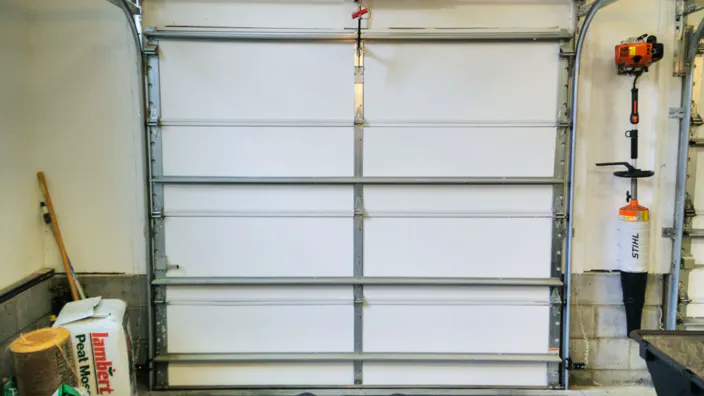A single bay garage door with insulation.