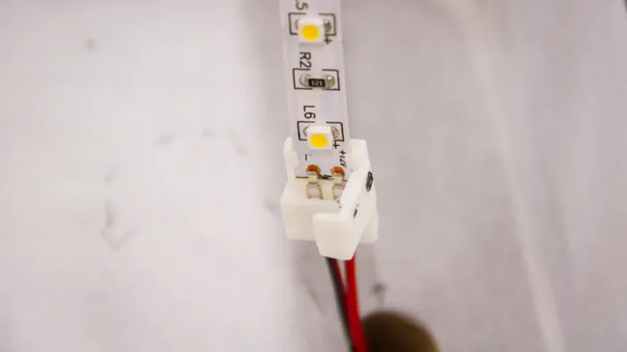 A LED light strip wiring connection switch.