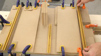 Clamps are applied to MDF.