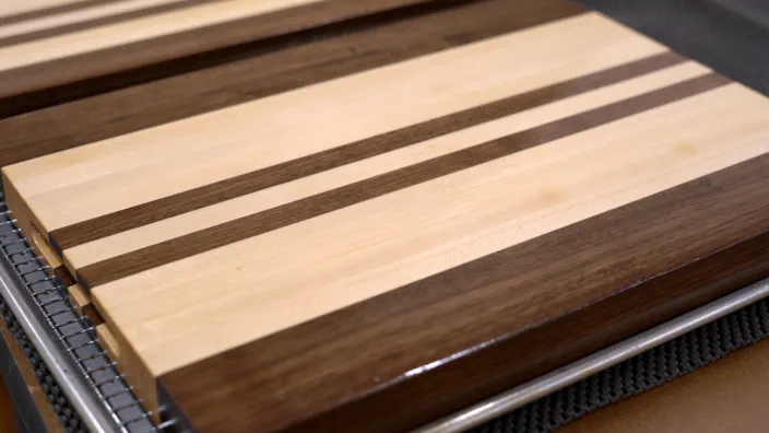 An edge grain cutting board with finish applied.