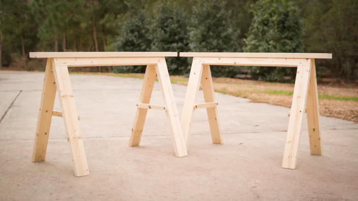 A pair of folding sawhorses built with 2x4s.