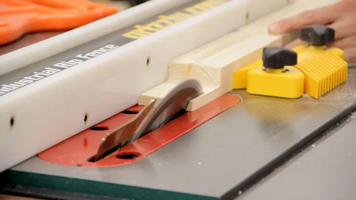 A table saw is used to rip a bevel