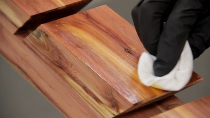 Polyurethane is applied to a cedar skateboard rack.