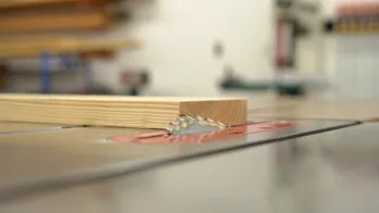 A table saw blade at a 45 degree angle.