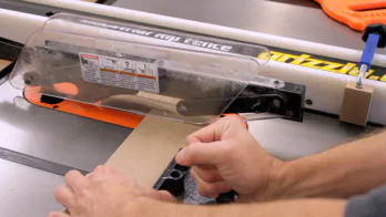 A table saw is used to cut the rack pieces.