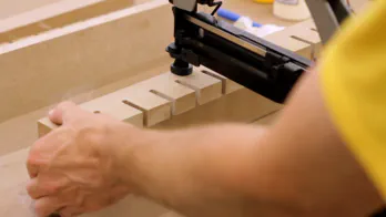 A nailgun is used to attach the top to the back.
