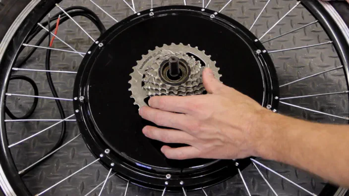 A 7-speed freewheel installed on an electric bicycle wheel.