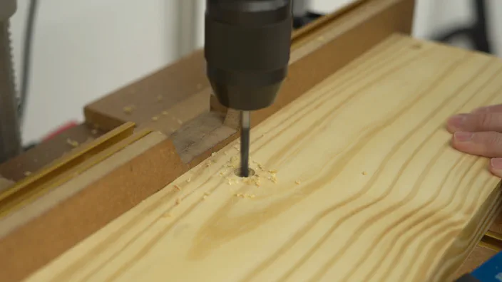 Counterbored holes are drilled at a drill press.