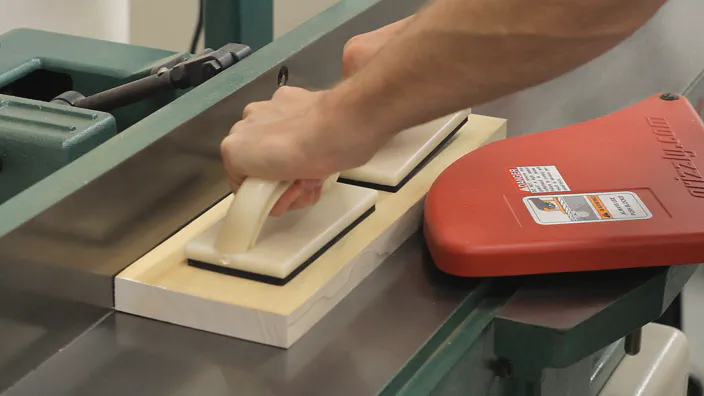 A jointer is used to flatten a board.